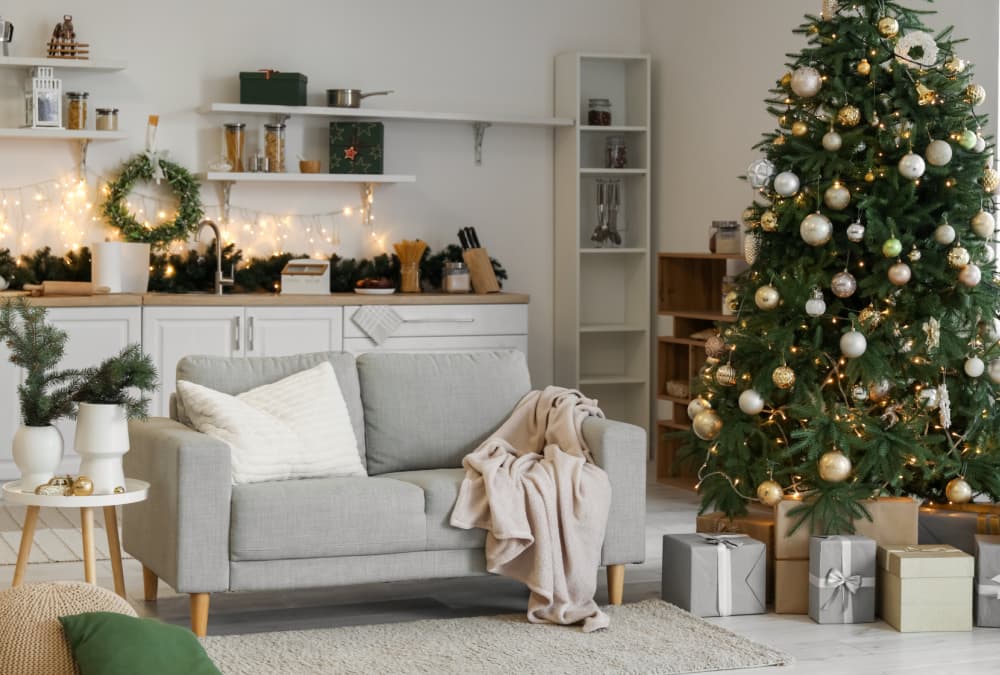 Fabric sofa next to Christmas Tree